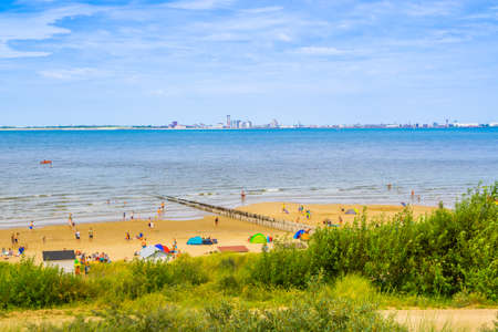 Tourists on the beach of breskens during summer season, Breskens, The netherlands, 20 July, 2020のeditorial素材