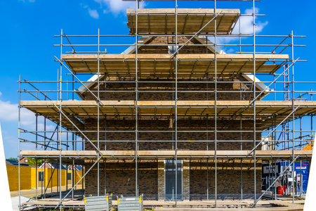 scaffolding around a house under construction, Rucphen, The Netherlands, 6 may, 2022のeditorial素材