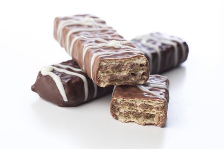 Chocolate covered waffle cookies isolated on white background.の写真素材