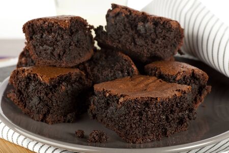 Tempting chocolate brownie treat, moist and delicious.の写真素材