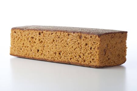 Dutch breakfast cake, often spiced with cloves cinnamon and nutmeg.  Isolated on white backgroundの写真素材