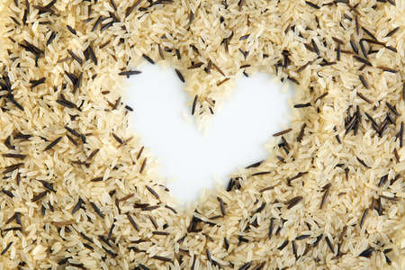Wild and brown rice with heart shape,  heart healthy foodの写真素材