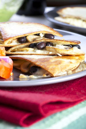 Black bean, mushroom and cheese quesadillas.の写真素材