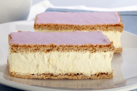 Tompouce, a common pastry  in the Netherlands and Belgium made  with puff pastry , filled with sweet...