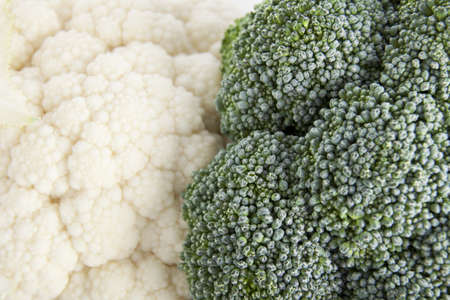 Close-up of fresh raw cauliflower and broccoli.の写真素材