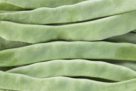 Raw french beans filling frame, perfect for food background.
