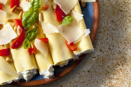 Cannelloni pasta stuffed with ricotta cheese, shot from directly above.の写真素材
