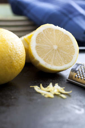 Lemon zest and cut lemon with vertical orientationの写真素材