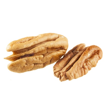 Shelled pecans isolated on white background 