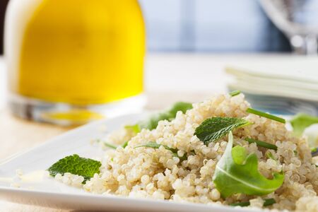 Fresh quinoa salad with herbs and arugulaの写真素材