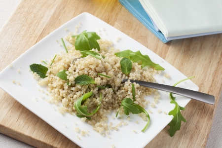 Fresh quinoa salad with herbs and arugulaの写真素材