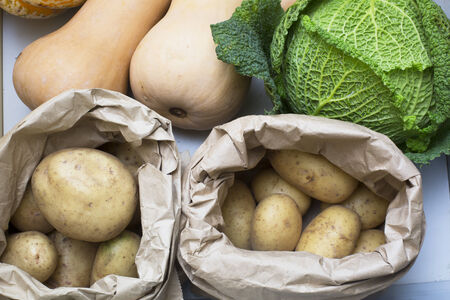 Potatoes, cabbage and butternut squash in drawer 