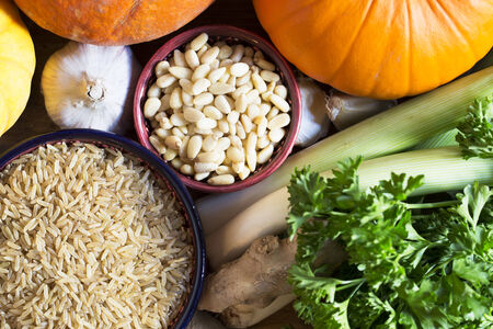 Brown rice and pine nuts other ingredients, healthy eating still lifeの写真素材