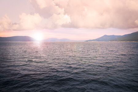 Sunset in Puget Sound with islands in the distance.の写真素材