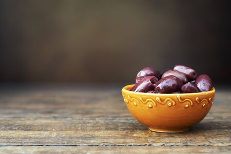 Bowl of Kalamata Olives on the table.の写真素材