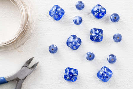 Blue Glass Beads with Wire and Wire Cuttersの写真素材