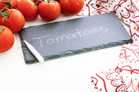 Fresh Tomatoes and Chalkboard Signの写真素材