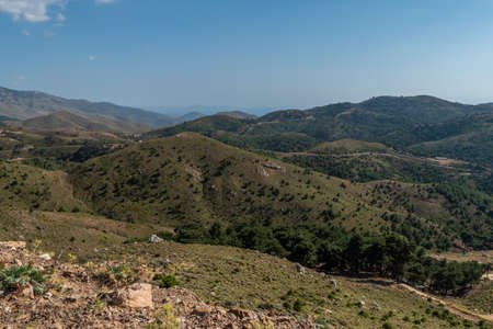 Chios hill view covered in with grass. horizontal. space for text.の写真素材