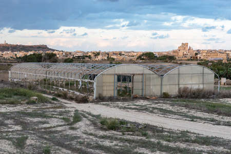 Two Old greenhouse in bad condition; need repair horizontal landscape view.の写真素材