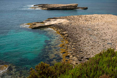 Delimara Winter Landscape Malta. while tracking around this beautiful bay or beach in serenity, tranquility, peaceful breath taking views . on a bright winter sunny day.の写真素材