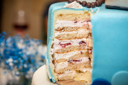 Holy Communion Cake decorated with bible and cross icing on topの写真素材