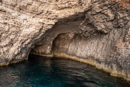 Natural caves formation by the sea in Malta at Cominoの写真素材