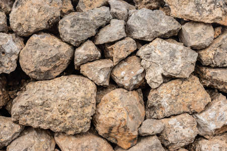 Seamless ashlar old Orange stone wall texture background. Horizontalの写真素材