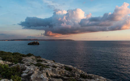 Mgarr Ix-Xini Bay Tower Gozo. Malta. Horizontal at sunsetの写真素材