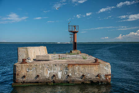 Abandoned old lighthouse on the island of St. Petersburg.の写真素材