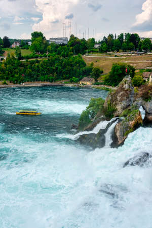 Neuhausen, Switzerland - July 2018: Rheinfall - the largest waterfall in Europe near Schaffhausen in Switzerlandのeditorial素材