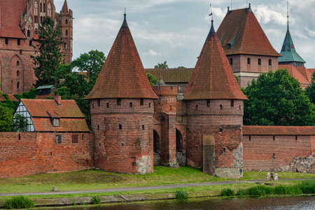 The Castle of the Teutonic Knights Order in Malbork (Marienburg), Poland, historical Prussia, is the...