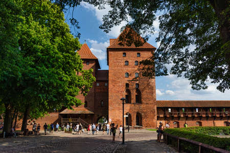 The Castle of the Teutonic Knights Order in Malbork (Marienburg), Poland, historical Prussia, is the largest castle in the world, 07/26/2020のeditorial素材