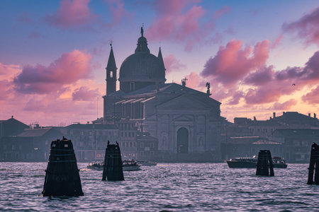 Breathtaking sunset over Le Zitelle, or Santa Maria della Presentazione, church at Grand Canal, Venice, Italyの写真素材