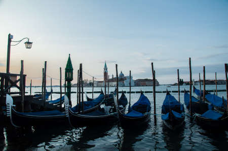 Gondolas on the Grand Canal in Venice, Italy at sunsetの写真素材