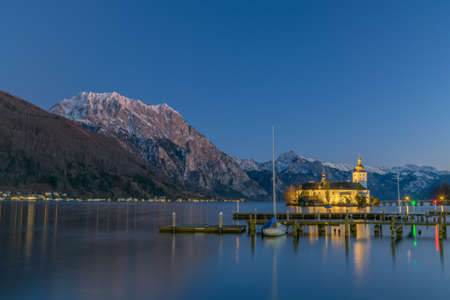 Nightview of Lake Traunsee with Castle Ort or Orth at Gmunden in Salzkammergut, Austria