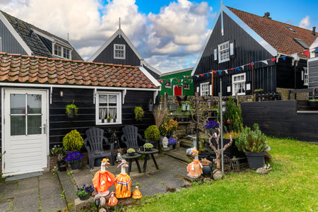 Beautiful typical fisherman village houses in Marken island, Waterland, Netherlands.の写真素材