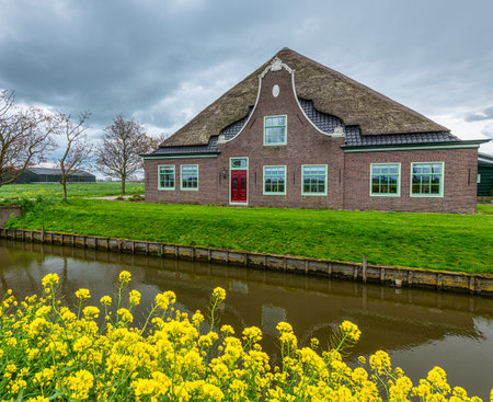 Typical Dutch houses and canals in Zaanse Schans, Netherlandsの写真素材