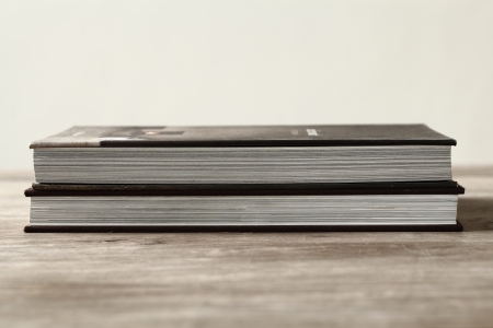 Old book over wooden tabel