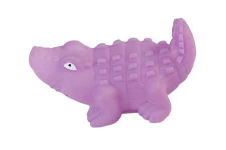 Toy crocodile rubber purple isolated on white backgroundの写真素材