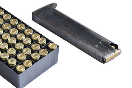Gun magazine with bullet box isolate on white background