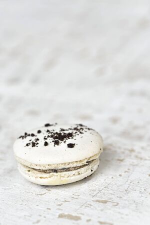 White macaron on wood plateの写真素材