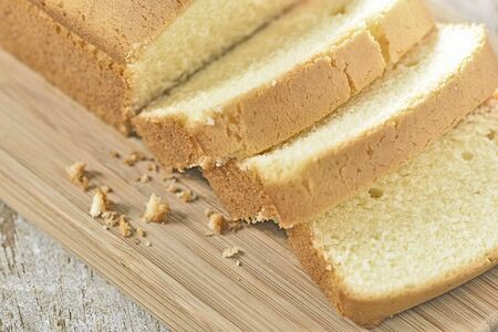 Slice butter cake on wood plate