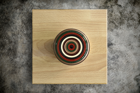 Green tea lacquer bowl on wood plate (Top View)の写真素材