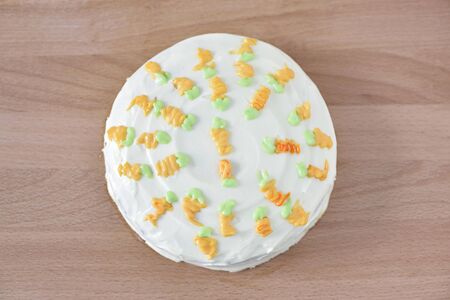 Carrot cake on wood plate