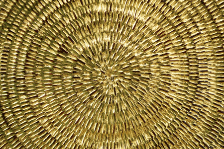 Antique woven gold textureの写真素材