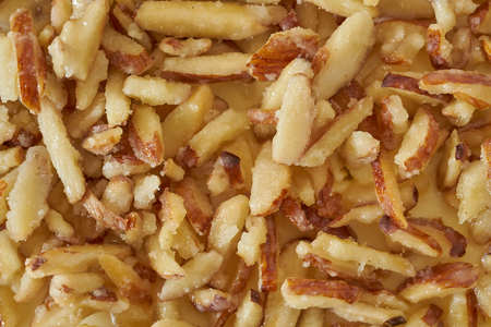 Cheesecake with almond sliced toppingの写真素材