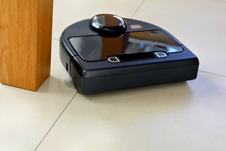A robot technology vacuum cleaner cleaning homeの写真素材