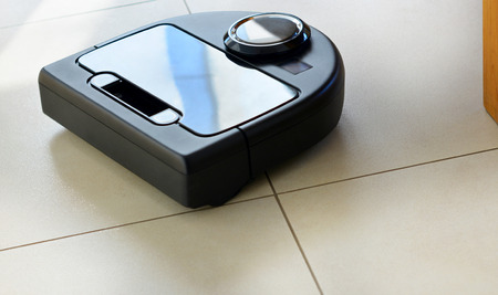 A robot technology vacuum cleaner cleaning homeの写真素材