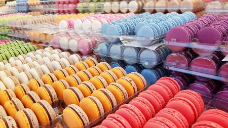 Colourful macaroons on the counter of candy shopの写真素材