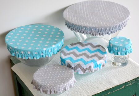 Set of bowls covered with reusable zero waste fabric cloth coversの写真素材